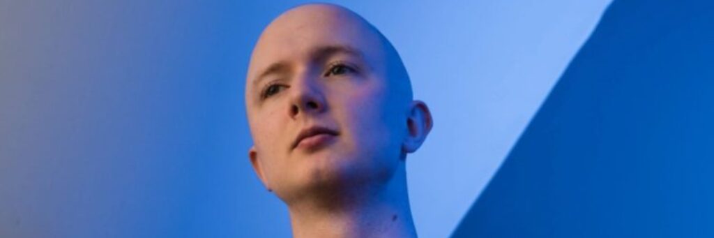 one person shown, the dominant colour of the image is blue
