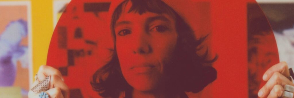 one person shown, the dominant colour of the image is red