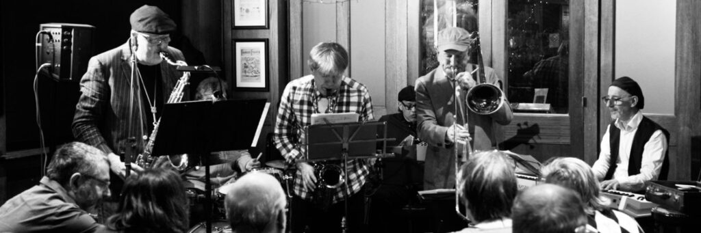Six quintet or small group shown, with a tie, in a group setting