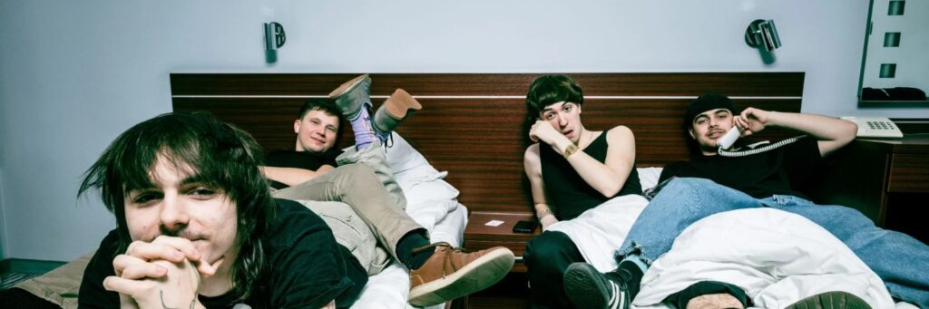 Three trio shown, indoors, with a bed