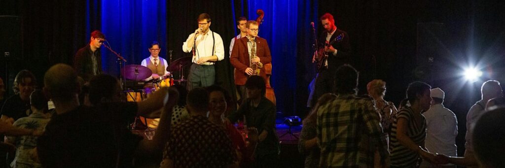Five quintet or small group shown, in a group setting