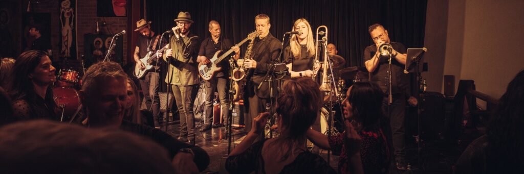 Five quintet or small group shown, in a group setting