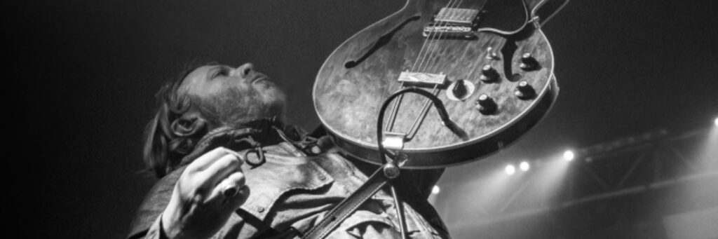 One soloist shown, with a motorcycle