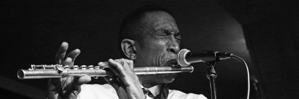 One soloist shown, with a tie