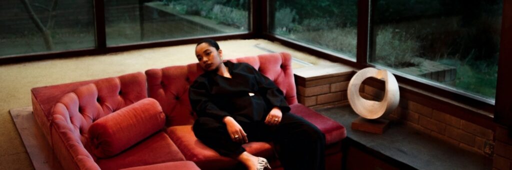 One soloist shown, indoors, with a couch