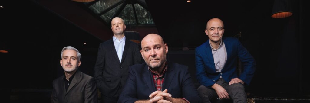 Four quartet shown, with a tie